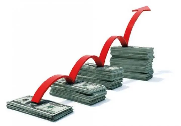 Graphique montrant une courbe ascendante sur des piles de billets, symbolisant la croissance de la bankroll.